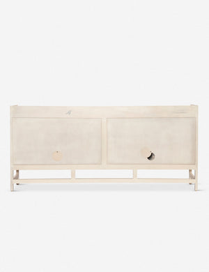 Rear view of the Philene natural mango wood sideboard with cane doors
