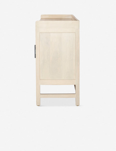#color::natural | Side view of the Philene natural mango wood sideboard with cane doors