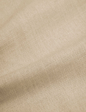 Close-up of the natural linen fabric on the Clementine platform bed