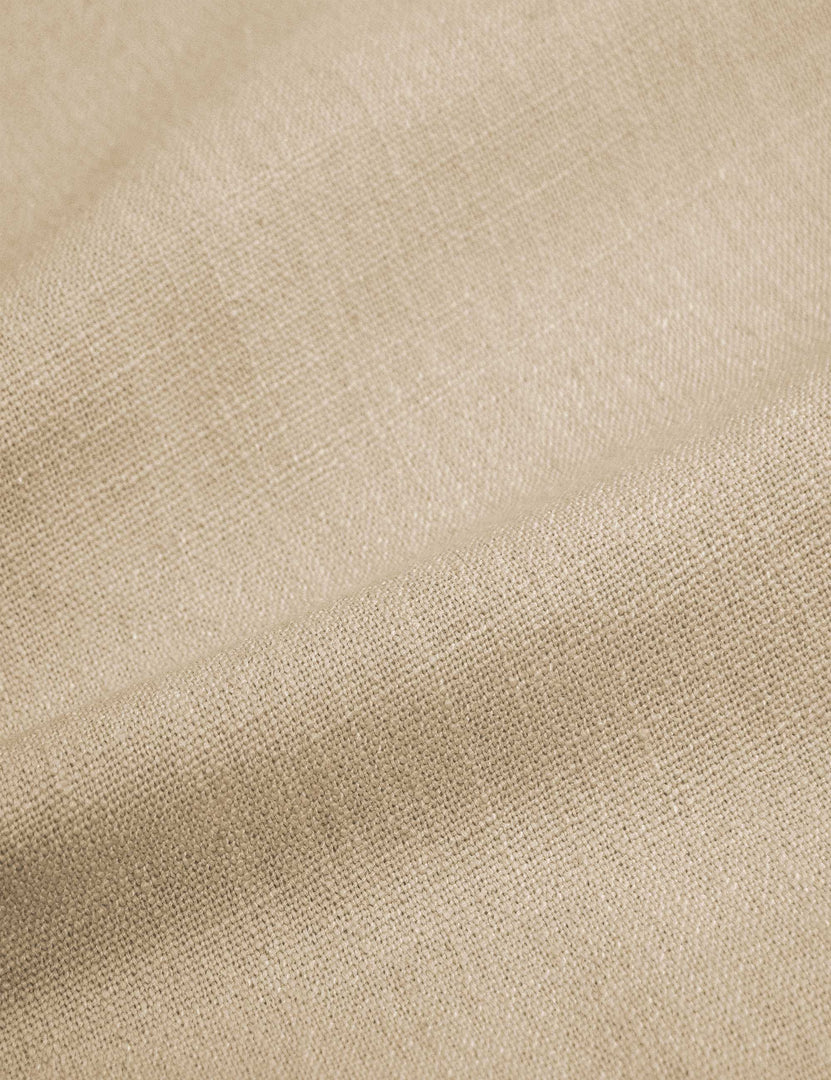 #color::natural-linen #size::twin #size::full #size::queen #size::king #size::cal-king | Close-up of the natural linen fabric on the Clementine platform bed