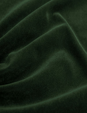 Close-up of the emerald velvet fabric on the Clementine platform bed