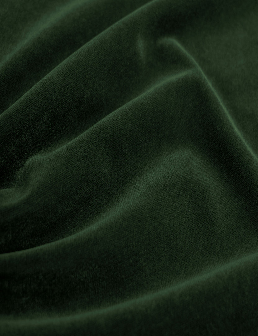 #color::emerald-velvet #size::twin #size::full #size::queen #size::king #size::cal-king | Close-up of the emerald velvet fabric on the Clementine platform bed