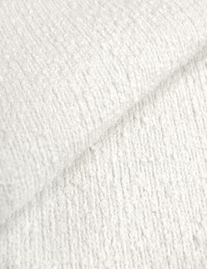 Close-up of the white boucle fabric on the Clementine platform bed