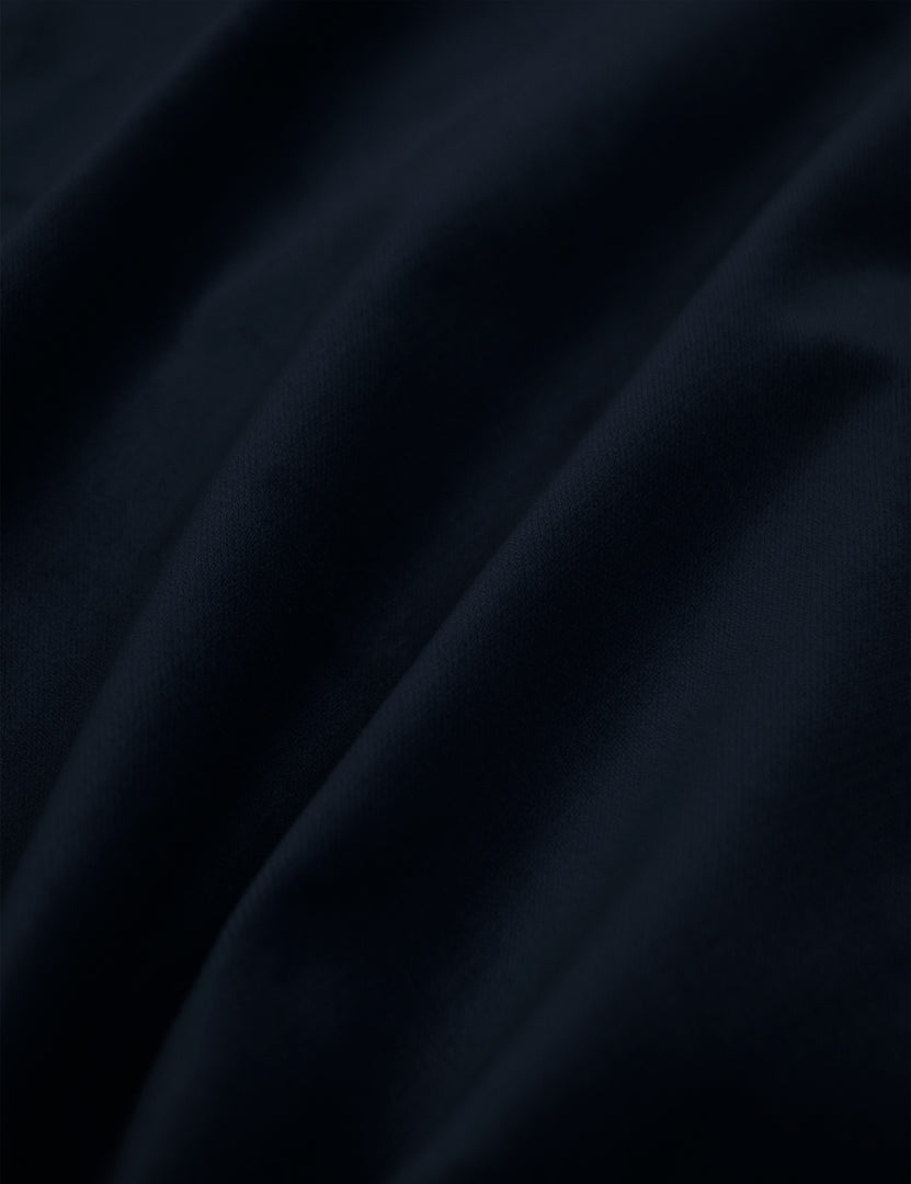 #color::navy-velvet #size::twin #size::full #size::queen #size::king #size::cal-king | Close-up of the navy velvet fabric on the Clementine platform bed