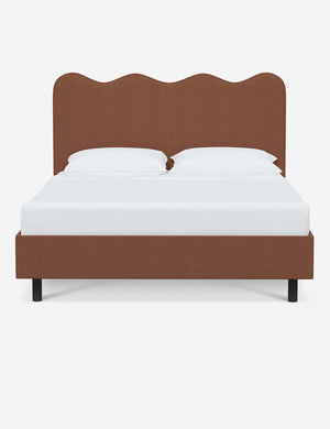 Clementine terracotta linen platform bed with undulating lined headboard