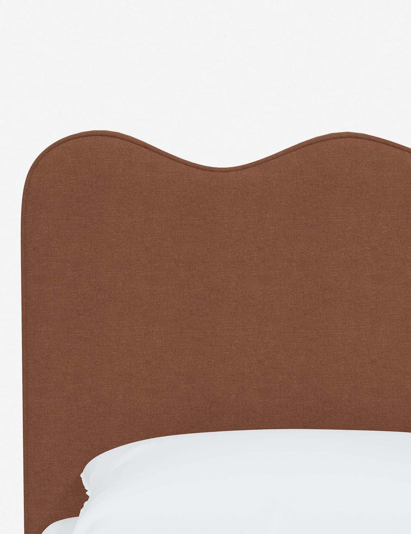 #color::terracotta-linen #size::twin #size::full #size::queen #size::king #size::cal-king | Close-up of the undulating lines on the headboard of the Clementine terracotta linen platform bed