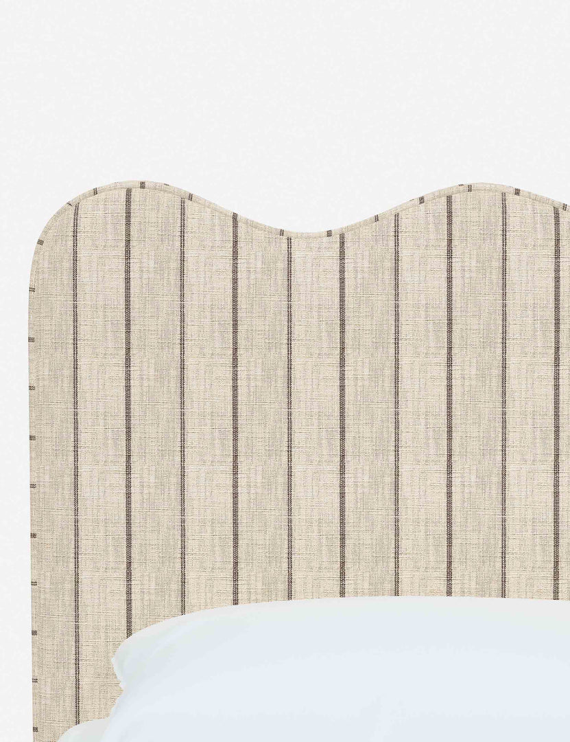 #color::natural-stripe #size::twin #size::full #size::queen #size::king #size::cal-king | Close-up of the undulating lines on the headboard of the Clementine natural stripe linen platform bed