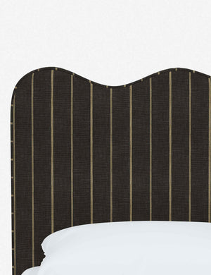Close-up of the undulating lines on the headboard of the Clementine peppercorn stripe linen platform bed