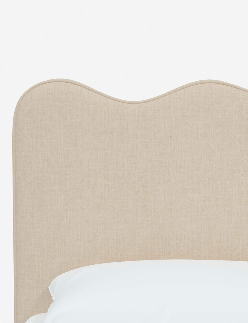 #color::natural-linen #size::twin #size::full #size::queen #size::king #size::cal-king | Close-up of the undulating lines on the headboard of the Clementine natural linen platform bed