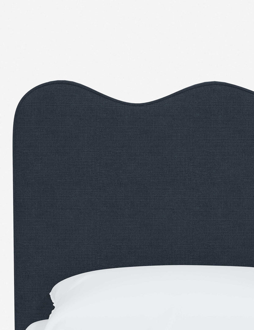 #color::navy-linen #size::twin #size::full #size::queen #size::king #size::cal-king#color::navy-linen #size::full #size::queen #size::king #size::cal-king | Close-up of the undulating lines on the headboard of the Clementine navy linen platform bed