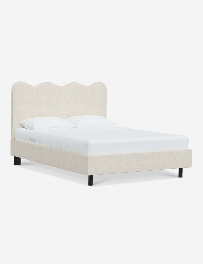 #color::talc-linen #size::twin #size::full #size::queen #size::king #size::cal-king | Angled view of Clementine talc linen platform bed with undulating lined headboard