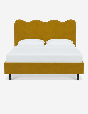 Clementine yellow citronella velvet platform bed with undulating lined headboard