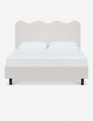 Clementine snow velvet platform bed with undulating lined headboard