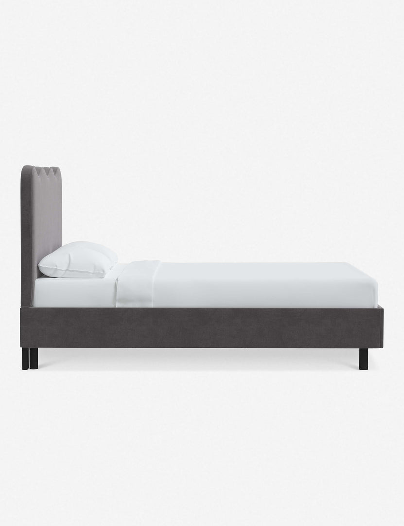 #color::steel-velvet #size::twin #size::full #size::queen #size::king #size::cal-king | Side view of Clementine steel velvet platform bed with undulating lined headboard