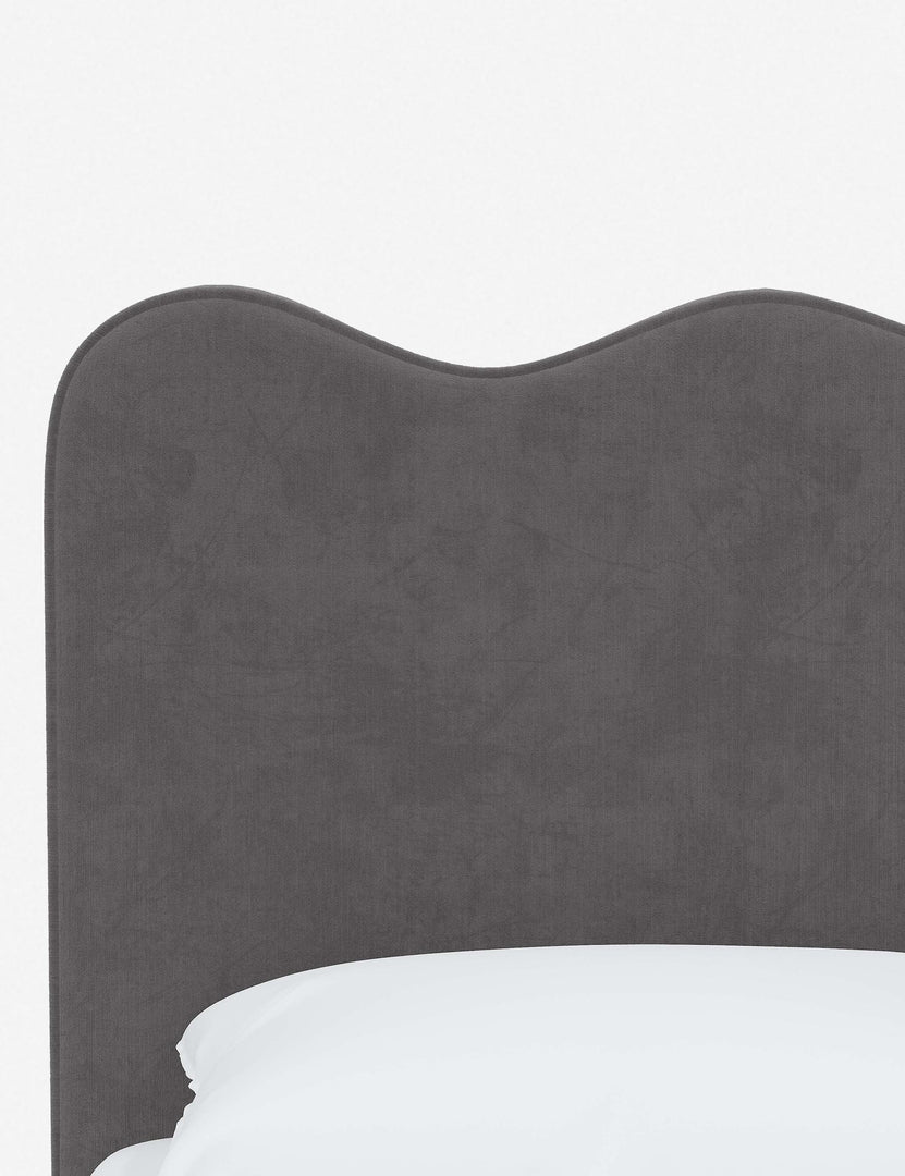 #color::steel-velvet #size::twin #size::full #size::queen #size::king #size::cal-king | Close-up of the undulating lines on the headboard of the Clementine steel velvet platform bed