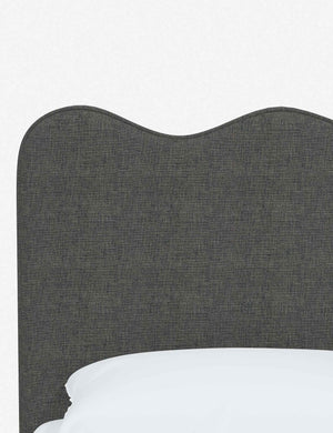 Close-up of the undulating lines on the headboard of the Clementine charcoal linen platform bed