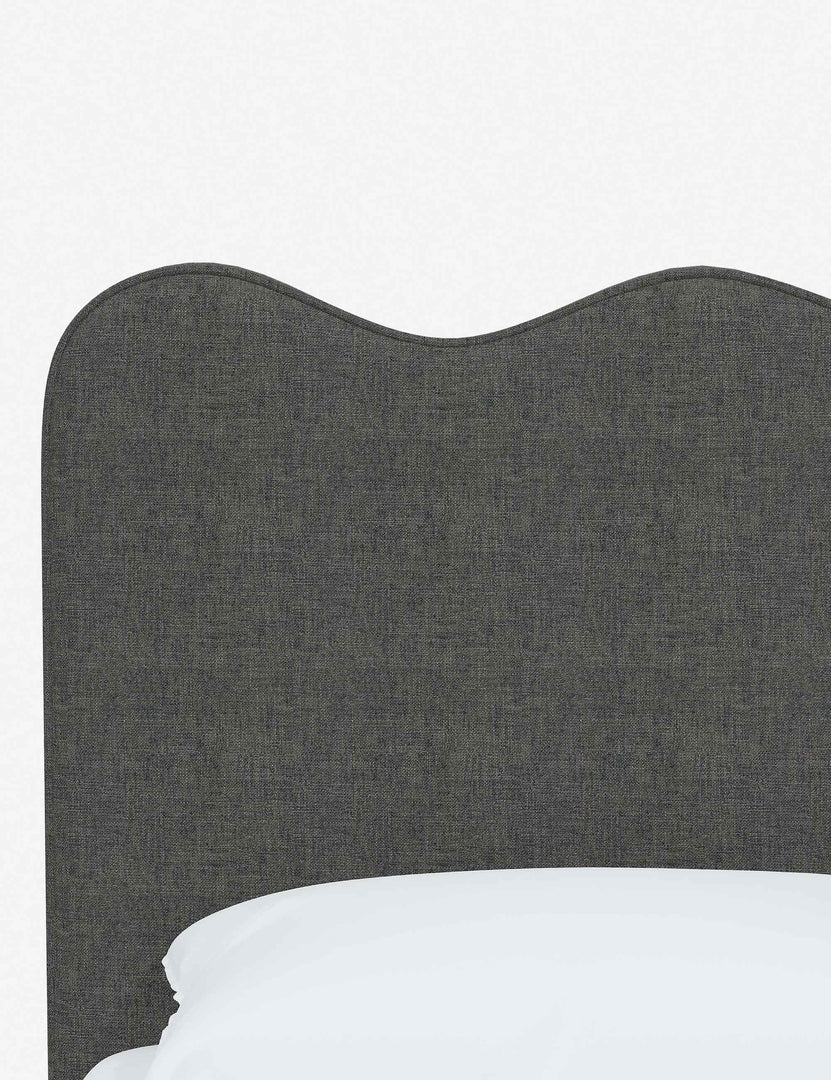 #color::charcoal-linen #size::twin #size::full #size::queen #size::king #size::cal-king | Close-up of the undulating lines on the headboard of the Clementine charcoal linen platform bed