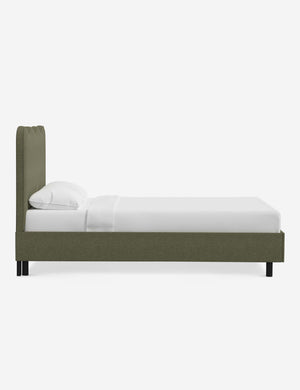 Side view of Clementine sage linen platform bed with undulating lined headboard