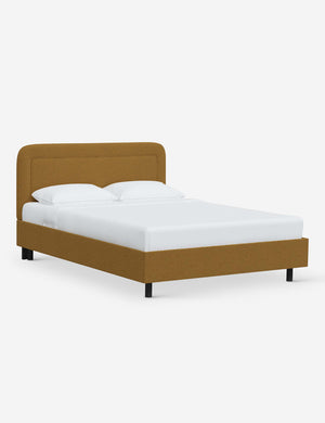 Angled view of the Gwendolyn Ochre Boucle Platform Bed