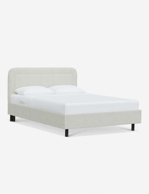 Angled view of the Gwendolyn White Boucle Platform Bed