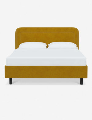 Gwendolyn Citronella Velvet Platform Bed with soft rounded corners and an interior welt border
