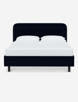 Gwendolyn Navy Velvet Platform Bed with soft rounded corners and an interior welt border