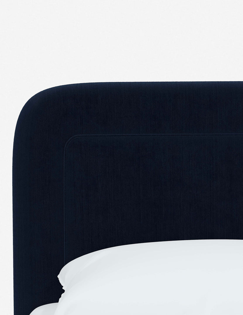 #color::navy-velvet #size::full #size::queen #size::king #size::cal-king | Close up of the rounded corners and interior welt border on the Gwendolyn Navy Velvet Platform Bed
