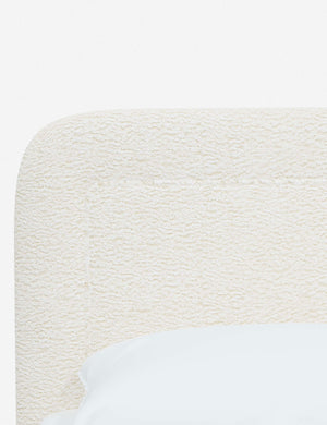 Close up of the rounded corners and interior welt border on the Gwendolyn Cream Sherpa Platform Bed