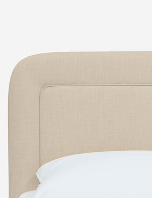 Close up of the rounded corners and interior welt border on the Gwendolyn Natural Linen Platform Bed