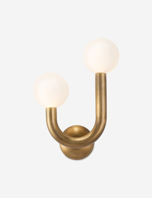 Natural-brass left-facing Happy Sconce by Regina Andrew