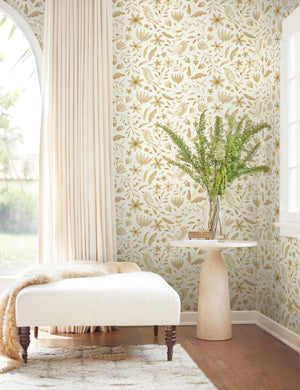 The Garden Birds Wallpaper is in a room with sheer pink curtains, a white linen ottoman, and an ivory stone round side table