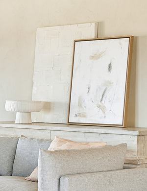The On Golden Pond I Wall Art unframed sits atop a whitewashed distressed sideboard with another white wall art