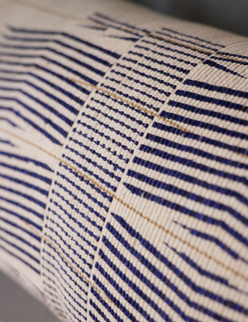 #color::blue #fill::down #fill::polyester | Close up of the Imli ivory and blue throw pillow