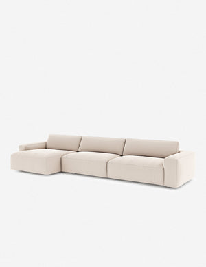 Angled view of the Mackenzie ivory linen left-facing sectional sofa