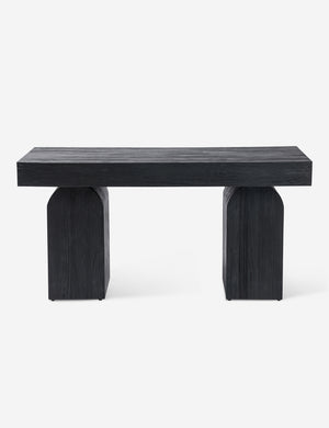 Back of the Mags sculptural solid wood desk in black.