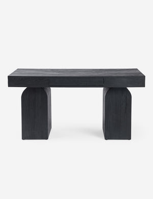 Mags sculptural solid wood desk in black.