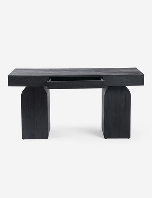 Mags sculptural solid wood desk in black with drawer open.