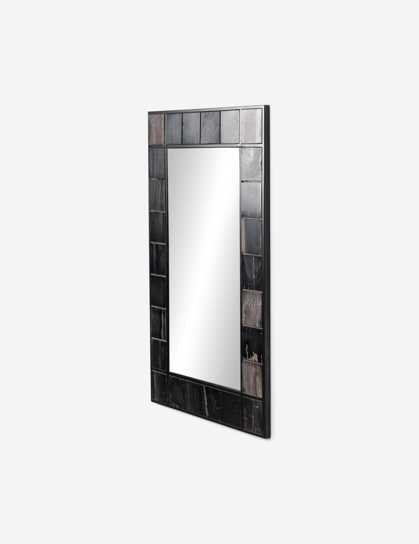 #color::petrified-wood | Angled view of the iron and petrified wood framed Magna wall mirror