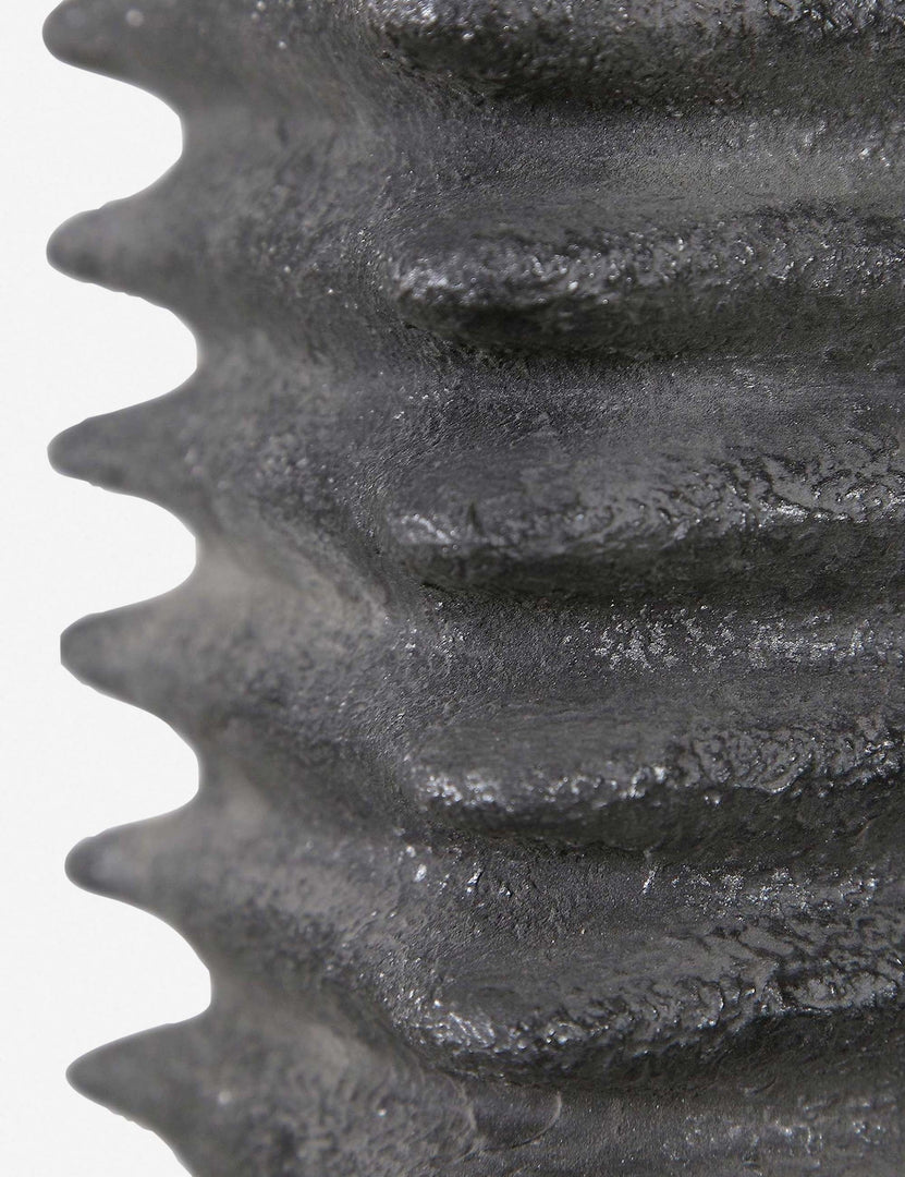 | Close-up of the ribbed base and metallic glaze on the Neva gray table lamp