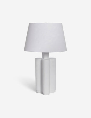 Duffy white table lamp with a sculptural pedestal base and a white linen shade