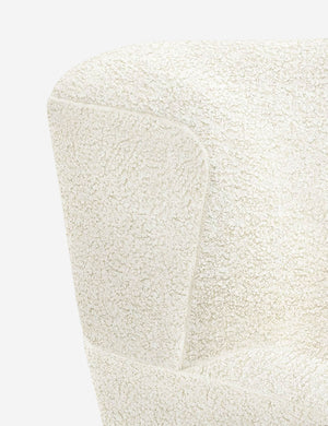 The stitching on the winged back of the Avery Boucle Cream accent chair