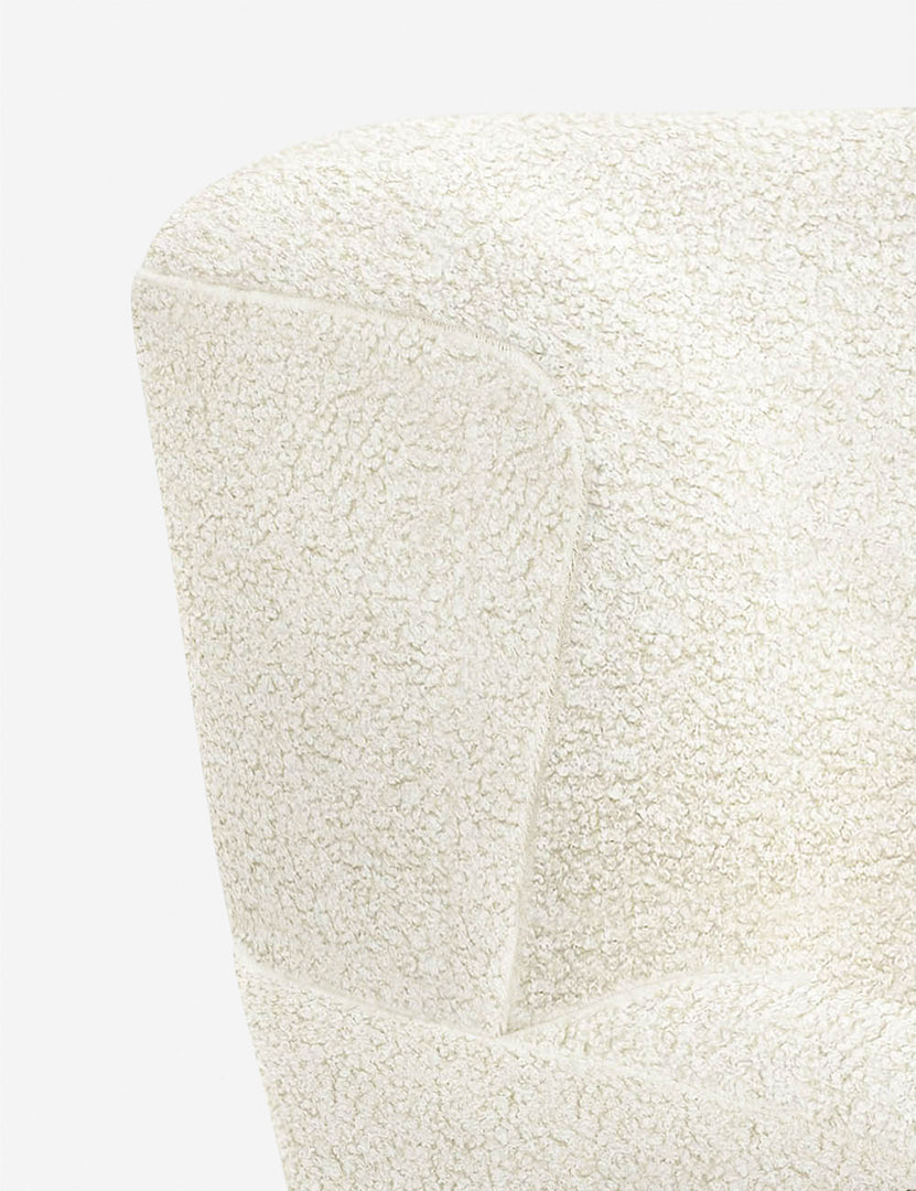 #color::boucle-cream | The stitching on the winged back of the Avery Boucle Cream accent chair