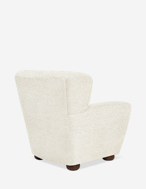 Angled rear view of the Avery Boucle Cream accent chair
