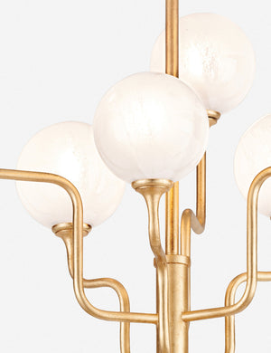Close-up of the frosted orb lights and gold leaf finish on the Keller 6 light chandelier