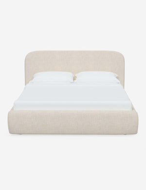 Nabiha upholstered Talc Linen platform bed with a rounded headboard