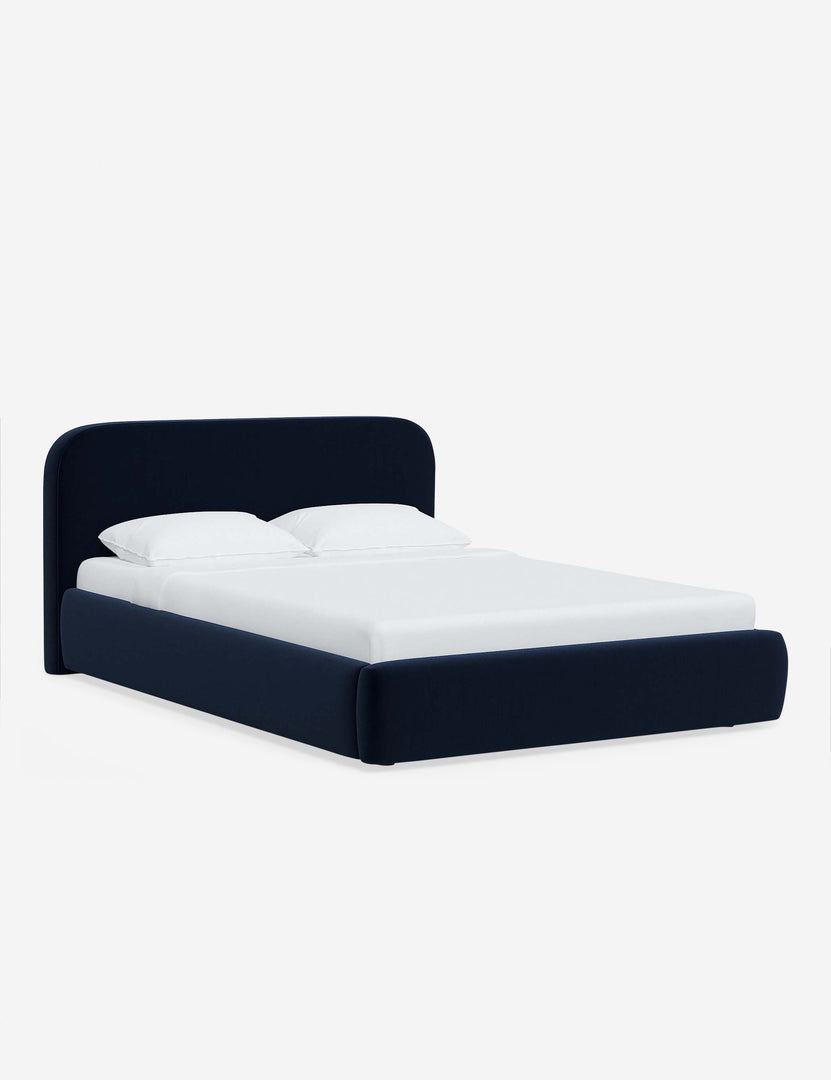 #color::navy-velvet #size::twin #size::full #size::queen #size::king #size::cal-king | Angled view of the Nabiha Navy Velvet platform bed