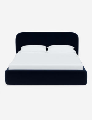 Nabiha upholstered Navy Velvet platform bed with a rounded headboard