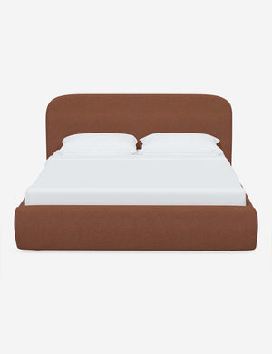 Nabiha upholstered Terracotta Linen platform bed with a rounded headboard
