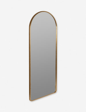 Angled view of the Shashenka gold arched floor mirror