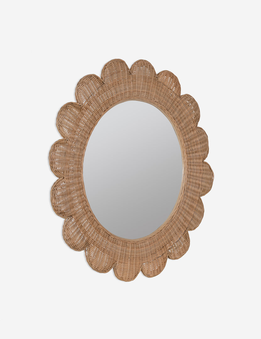 #color::natural | Angled view of Asha round scalloped wicker framed wall mirror